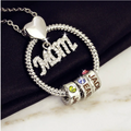 The Halo MOM circle birthstone necklace in silver with engraved name beads