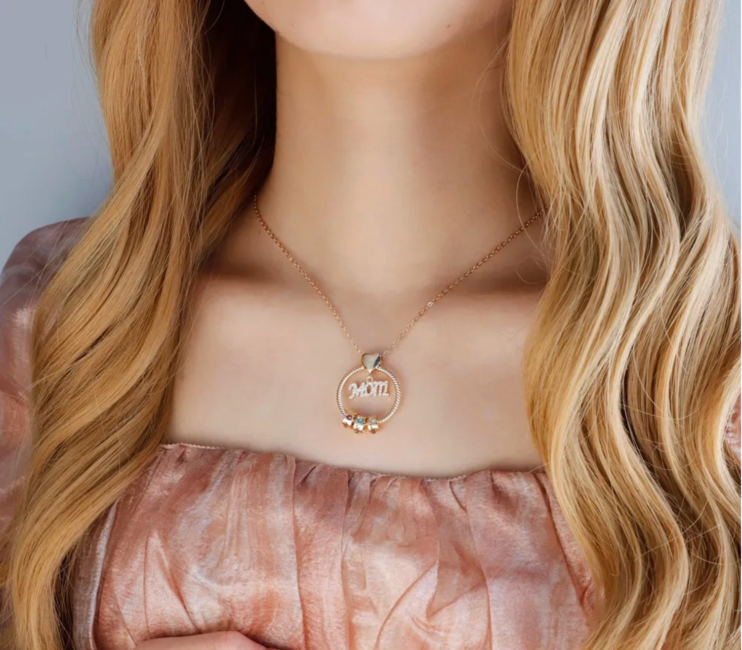 The Halo MOM circle necklace worn in rose gold